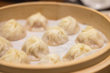 Xiaolongbao,steamed dumpling on the plate © noppawan09