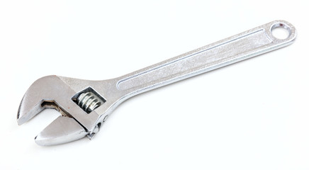 Metal wrench on white background