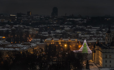 Vilnius old town panorama at night. Vilnius Aerial panorama of the Old Town. Night panorama of the Vilnius Old Town from Hill of Three Crosses, Lithuania. Vilnius winter aerial panorama of Old town.