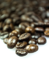 Close Up of Roasted Coffee Beans Isolated on White Background