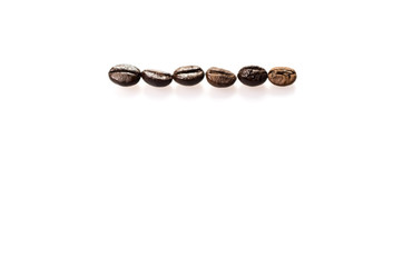 Close Up of Roasted Coffee Beans Isolated on White Background