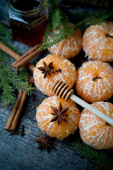 Fresh juicy tangerines with spices by New Year
