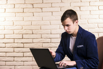 a man working at a laptop