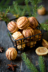 Home-made cookies nutlets with boiled condensed milk by New year and Christmas
