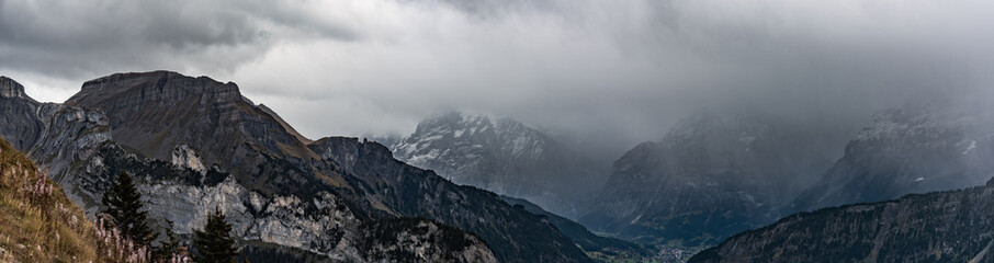 A view of a nearby mountain range from a hiking path on Aplengarten Schynige Platte near Interlaken, Switzerland