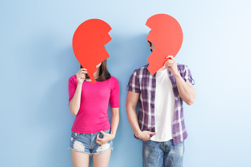 young couple take broken heart
