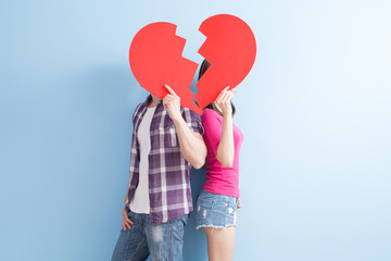 young couple take broken heart