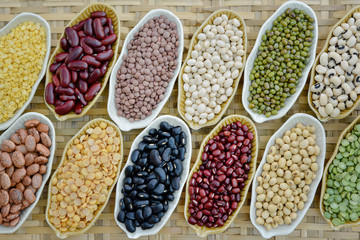 Different dried legumes in ceramic container, Prepared multicolor dried legumes for cooking