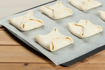 Cooking Of Homebaked Hungarian Cheese Puff Pastry Parcels.