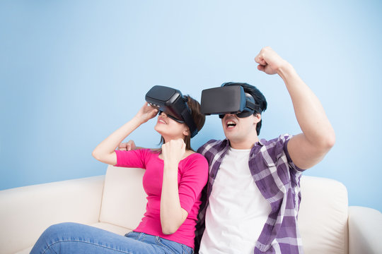 young couple watch vr ecited