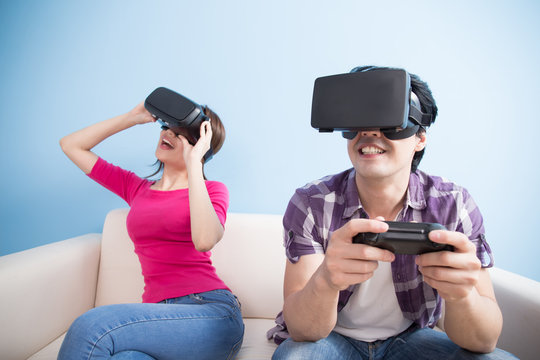 young couple play vr game