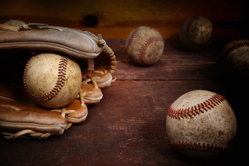 Old Vintage Baseball Background. Focus on ball in glove