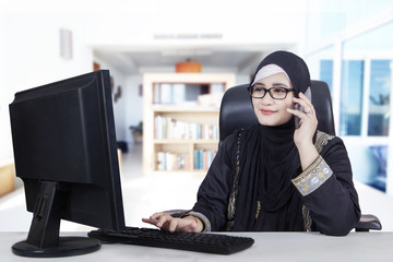 Arabic woman working at home