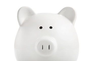 White piggy bank on a white background