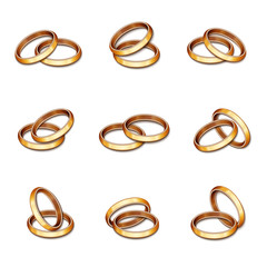 Set of plain gold wedding rings on white