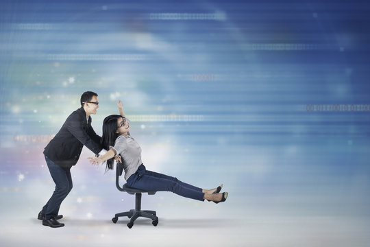 Businesswoman moving fast with her partner