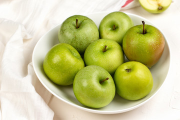 Apple on white table