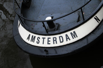 Amsterdam sign on stern of the boat