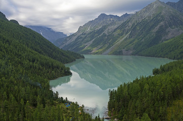 Reflection of mountains in the lake. Kucherla lake. Altai Mounta