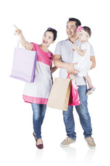 Smiling family shopping together