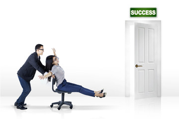 Woman moving fast toward success door