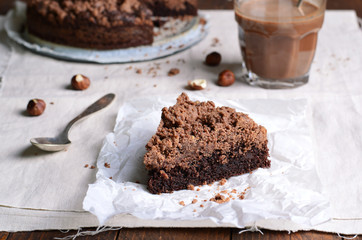 Chocolate Crumble Pie, Hazelnut Brownie on Beige and Wooden Background