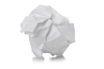 Crumbled white paper ball on white background