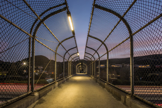 Pedestrian Footbridge with Long Exposure of US 101 Traffic Lights During Sunset in Agoura Hills, Los Angeles County
