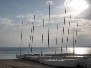 Catamarans on the beach, sailing club waiting for season