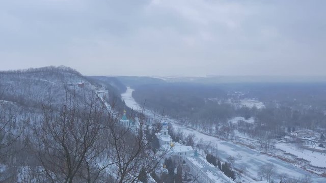 Orthodox Sviatogorskaya Lavra in Snowy Mountains Being Shot From Artyom Monument Observation Deck With an Impressive Pan View