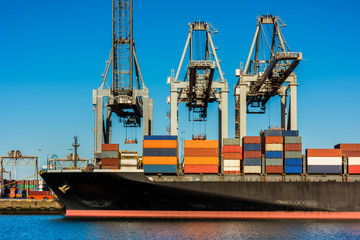 Container Ship being loaded in Harbour of Rotterdam, Netherlands.