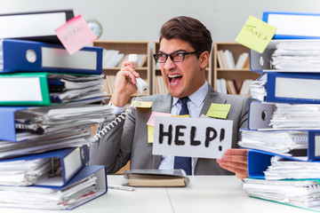 Busy businessman asking for help with work
