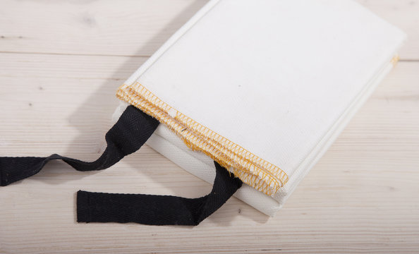 Fireblanket on wooden background