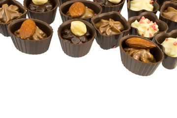 chocolate candy with nuts isolated on white background