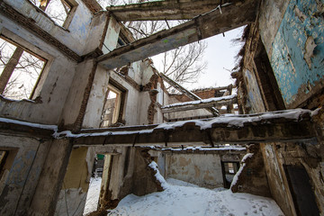 Fototapeta na wymiar destroyed house after an earthquake, snow disaster, house fire
