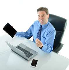 Business or sales man enthusiastic about using devices and his financial success