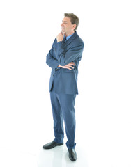 Business man standing and thinking of new ideas or solutions to business problems