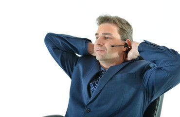 Business man on the phone with client or customer service representative helping people in a relaxed posture