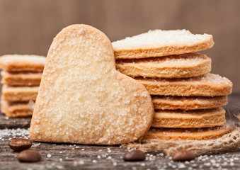Homemade baking. Cookie on the valentine's day. Lovely heart shaped a shortcake dough with spices for valentines. Close up.