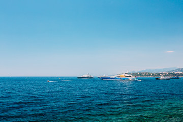 Modern Yacht in Bay In Sunny Summer Day. Vacation
