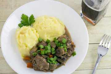 Beef and beer Irish stew with mashed potatoes