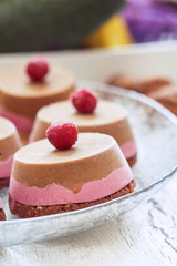 Raw vegan dessert with sour cherry served on glass plate