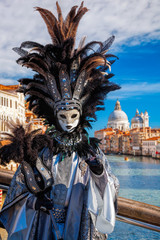Obraz premium Carnival mask against Basilica di Santa Maria della Salute in Venice, Italy