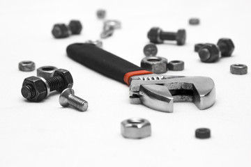 Hand tools, nuts and bolts, white background