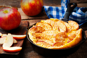 Cinnamon Apple Dutch Baby Pancake in iron pan