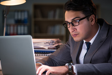 Man staying in the office for long hours