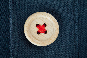 button on a polo t-shirt fabric texture