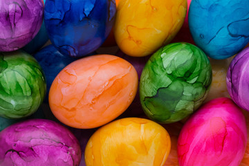 Easter eggs painted in colors on a white background.