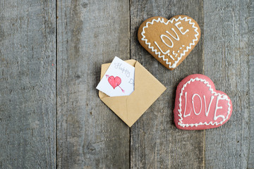 Beautiful heart cookie for valentine day on wooden table. top view