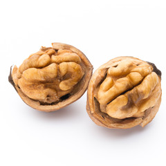 Walnut and walnut kernel isolated on the white background.